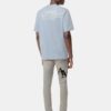 SKINNY-JEANS MIT VERSETZTEM LOGO