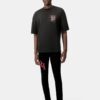 SKINNY-JEANS MIT VERSETZTEM LOGO – Schwarz-Rot
